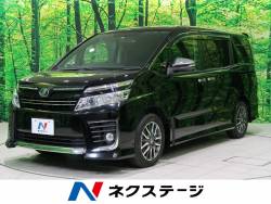 ヴォクシー ZS 煌 純正9型ナビ 両側電動スライドドア 禁煙車 バックカメラ Bluetooh再生 フルセグTV ETC LEDヘッドライト 7人乗 スマートキー ロールサンシェード シートバックテーブル ヴォクシー ZS 煌 純正9型ナビ 両側電動スライドドア 禁煙車 バックカメラ Bluetooh再生 フルセグTV ETC LEDヘッドライト 7人乗 スマートキー ロールサンシェード シートバックテーブルの中古車画像