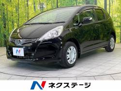 フィット G・10thアニバーサリー 純正SDナビ 禁煙車 スマートキー ETC コーナーセンサー ステアリングスイッチ アイドリングストップ 電動格納ミラー プライバシーガラス シートリフター パワーウィンドウ フィット G・10thアニバーサリー 純正SDナビ 禁煙車 スマートキー ETC コーナーセンサー ステアリングスイッチ アイドリングストップ 電動格納ミラー プライバシーガラス シートリフター パワーウィンドウの中古車画像