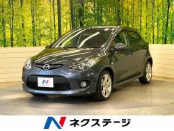 デミオ スポルト HIDヘッド 純正16インチアルミ キーレスエントリー マニュアルエアコン CD再生 電動格納ミラー パドルシフト 革巻きステアリング 禁煙車 ワンオーナー プライバシーガラス デミオ スポルト HIDヘッド 純正16インチアルミ キーレスエントリー マニュアルエアコン CD再生 電動格納ミラー パドルシフト 革巻きステアリング 禁煙車 ワンオーナー プライバシーガラスの中古車画像
