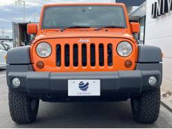 ジープ・ラングラーアンリミテッド オレンジの中古車画像