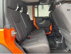 ジープ・ラングラーアンリミテッド オレンジの中古車画像