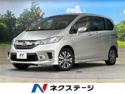 フリードハイブリッド ハイブリッド・ジャストセレクション 禁煙車 両側電動スライドドア バックカメラ ETC Bluetooth再生 HIDヘッドライト LEDフォグライト クルーズコントロール ハーフレザーシート プライバシーガラス DVD再生 フリードハイブリッド ハイブリッド・ジャストセレクション 禁煙車 両側電動スライドドア バックカメラ ETC Bluetooth再生 HIDヘッドライト LEDフォグライト クルーズコントロール ハーフレザーシート プライバシーガラス DVD再生の中古車画像