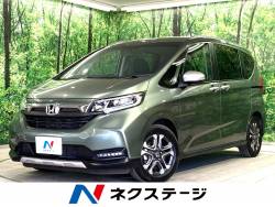 フリード クロスター・ホンダセンシング 禁煙車　純正ＳＤナビ　両側パワースライド　シートヒーター　バックカメラ　衝突軽減　アダプティブクルーズコントロール　スマートキー　ＬＥＤヘッドライト　ＥＴＣ　レーンアシスト　純正１５インチアルミの中古車画像