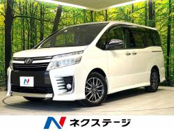 ヴォクシー ＺＳ　煌 禁煙車　純正９型ナビ　純正フリップダウンモニター　両側パワースライドドア　フルセグＴＶ　Ｂｌｕｅｔｏｏｔｈ接続　ＥＴＣビルトイン　オートエアコン　オートライト　ＬＥＤヘッド　純正１６インチアルミの中古車画像